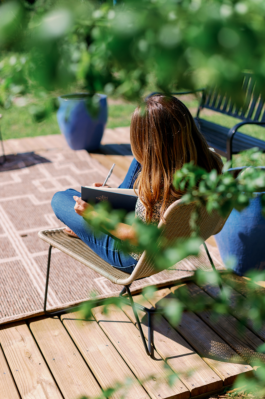 woman reads book at inpatient rehab center