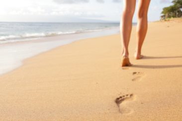 woman walks along beach at drug rehab provided by cigna rehab coverage woman walks along beach at drug rehab provided by cigna rehab coverage
