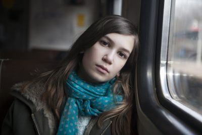 student looking out a window