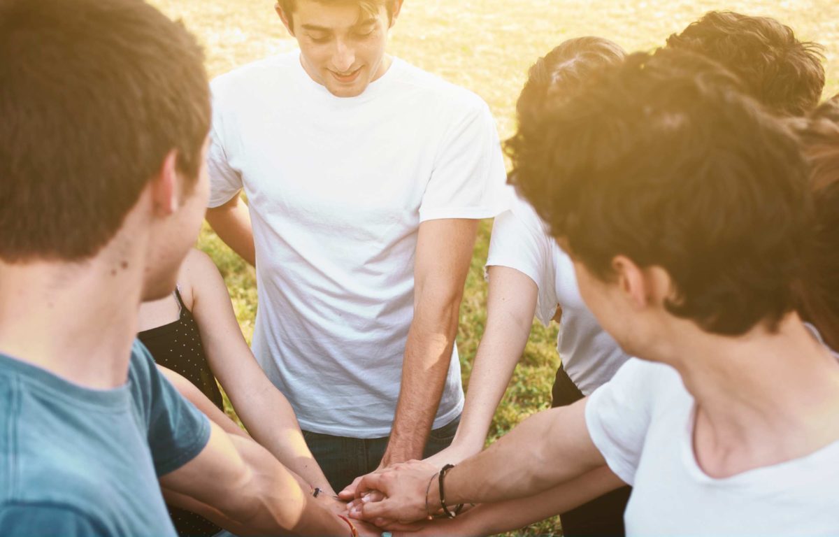 Family holding hands together