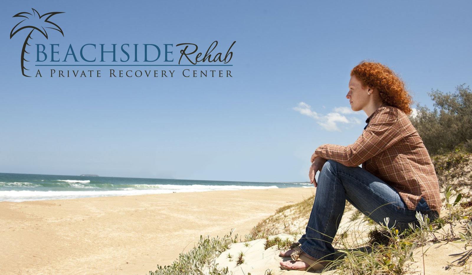 woman looking out at ocean