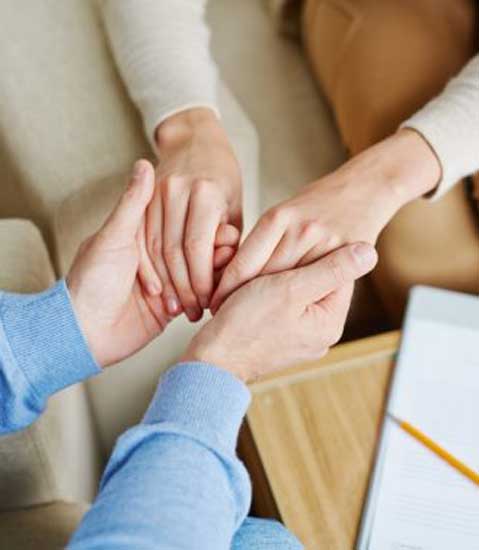 hands holding hands helping through grief