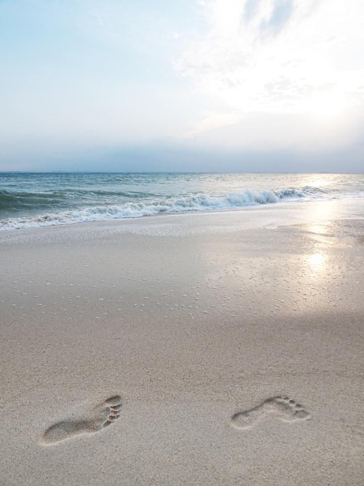 foot steps in the sand at Beachside