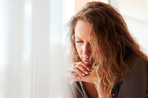 woman contemplating rehab