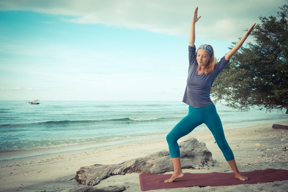woman practices yoga during outpatient drug recovery woman practices yoga during outpatient drug recovery